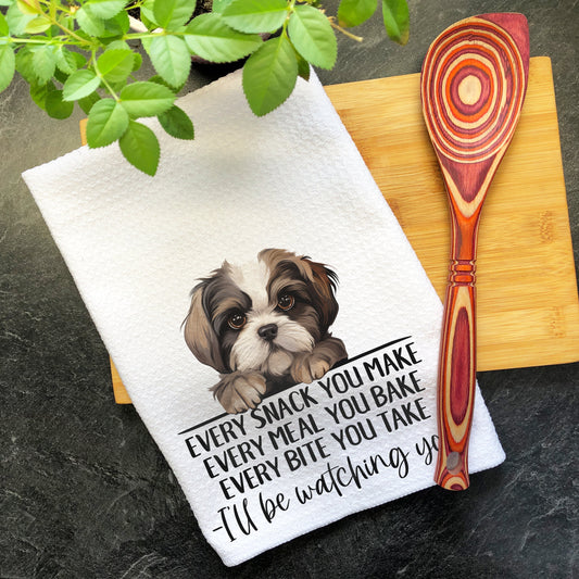 a tea towel with a picture of a dog on it