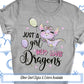 a gray shirt that says just a girl who loves dragon