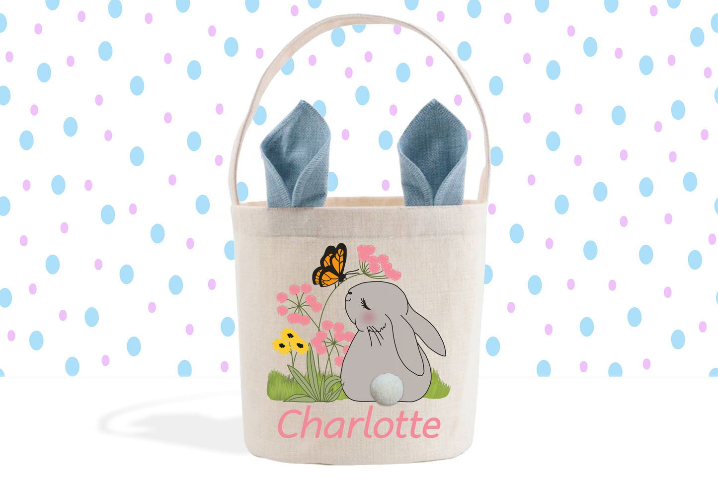a bag with a bunny and a butterfly on it