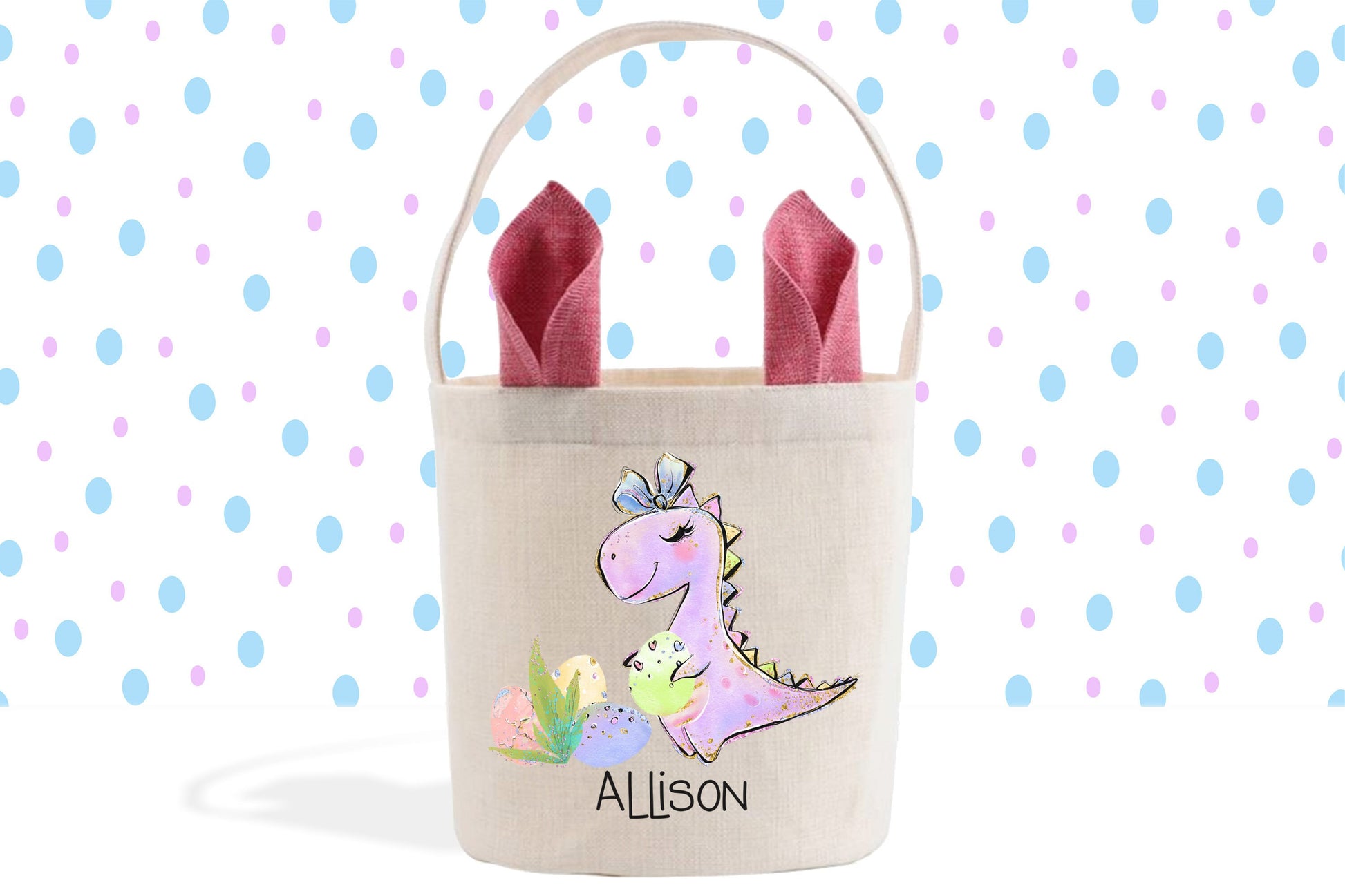 a small bag with two dinosaur ears sticking out of it